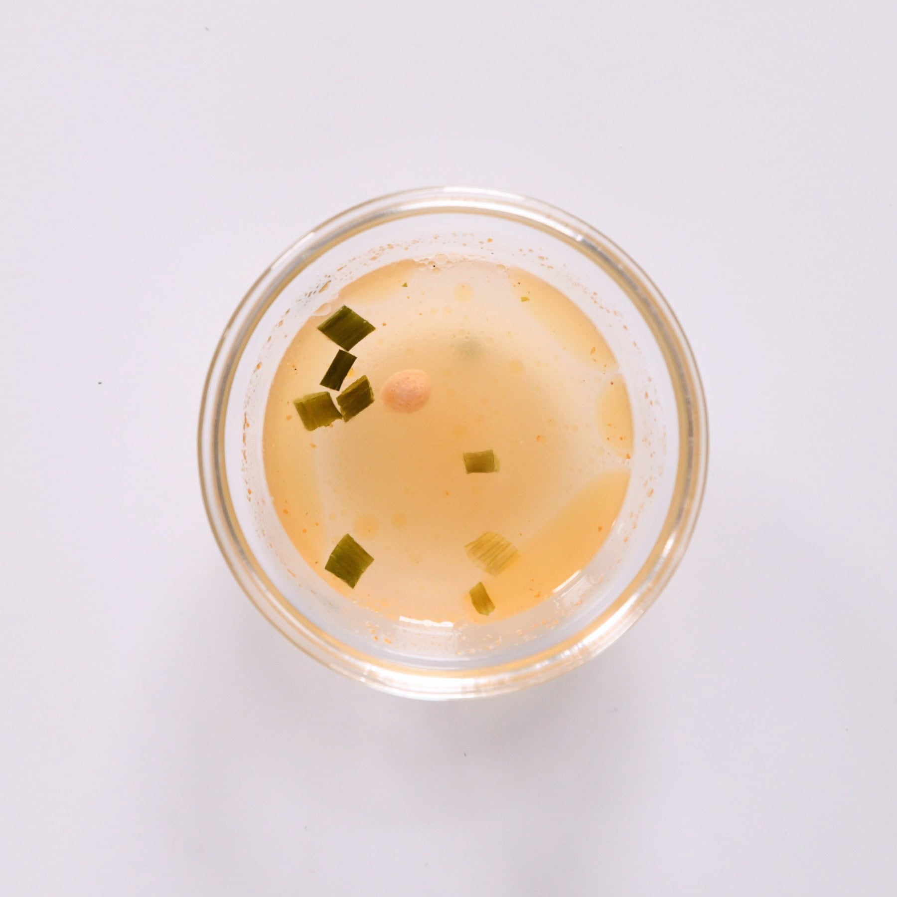 pho broth in glass ramekin