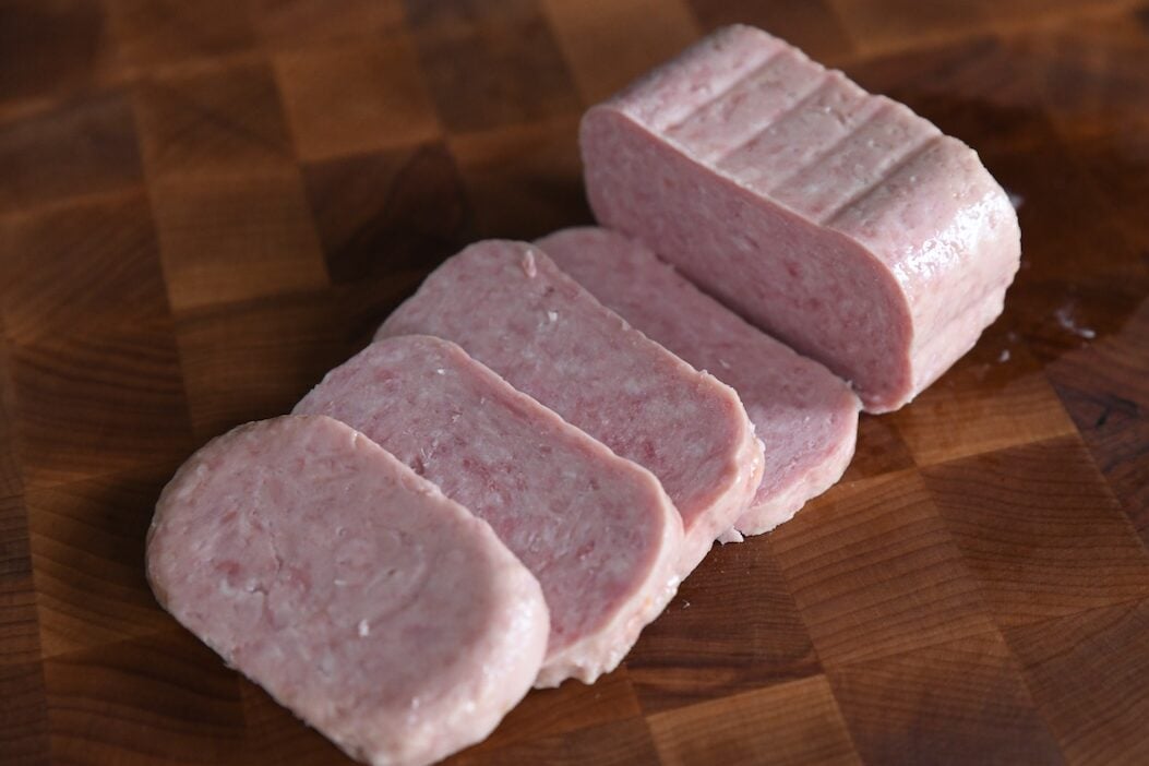 slices of luncheon meat on cutting board