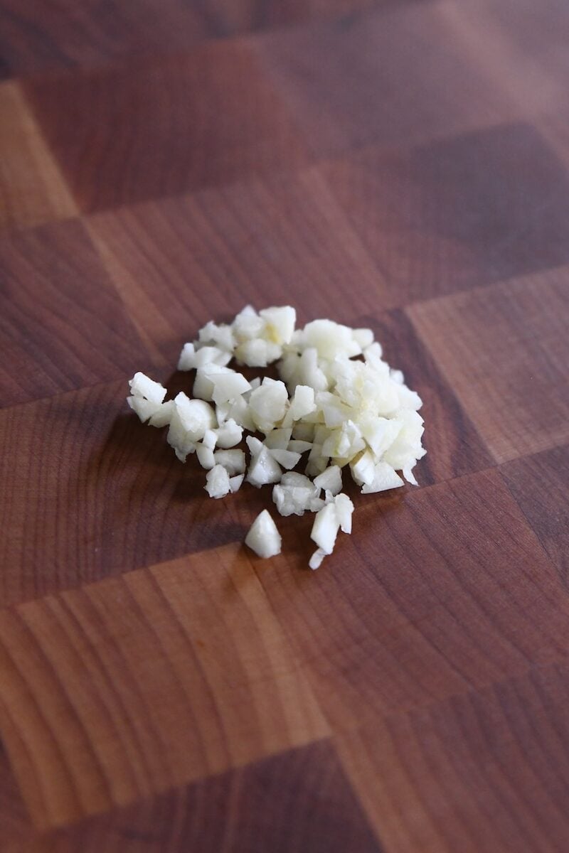 minced garlic on cutting board