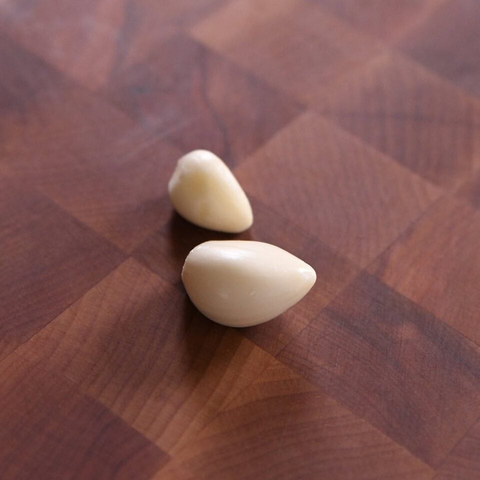 two peeled garlic cloves