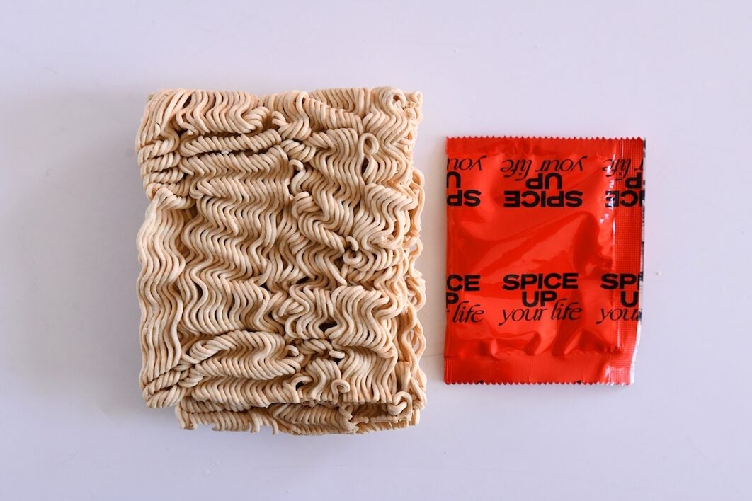 Immi Spicy Beef Ramen Soup noodle brick and spice packet