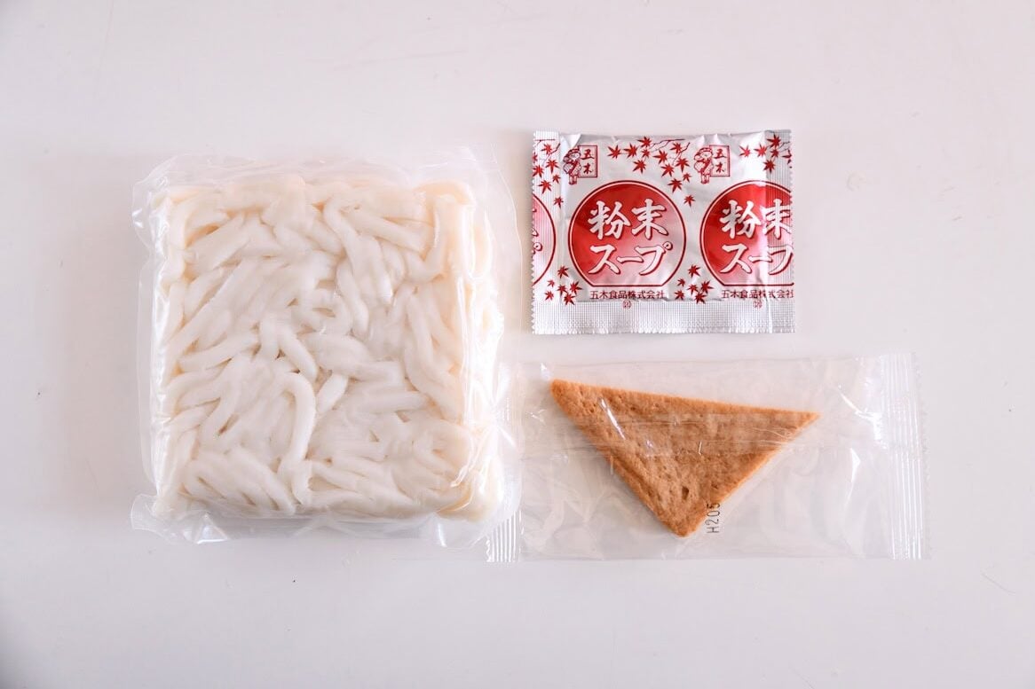 Itsuki Nabeyaki Stove Top Udon noodles in package, seasoning packet and dried tofu