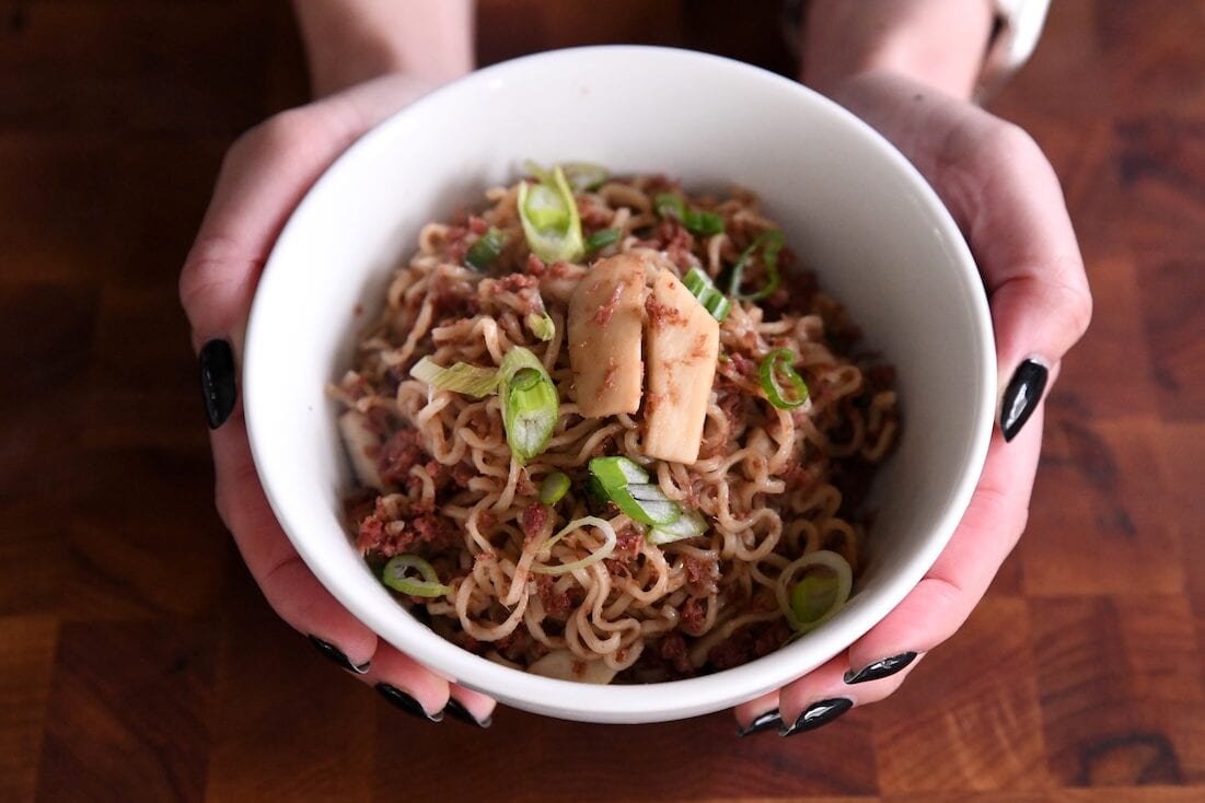 bowl of instant ramen topped with green onions