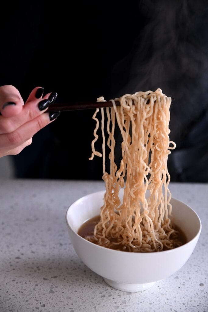 Noodle pull with chopsticks