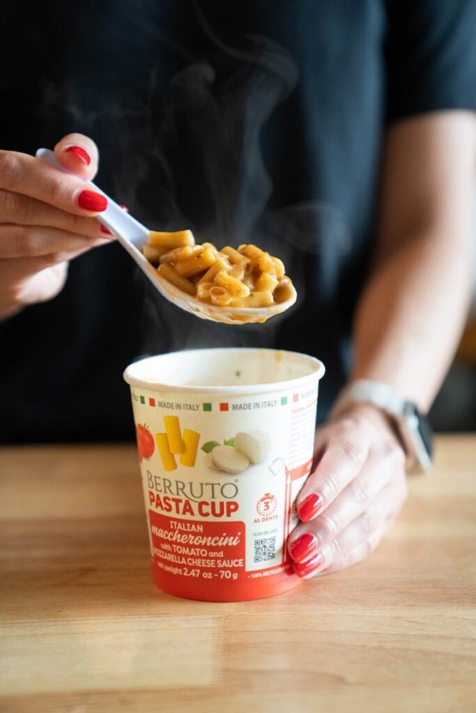Berruto Maccheroncini Pasta Cup being lifted with a spoon showing pasta texture