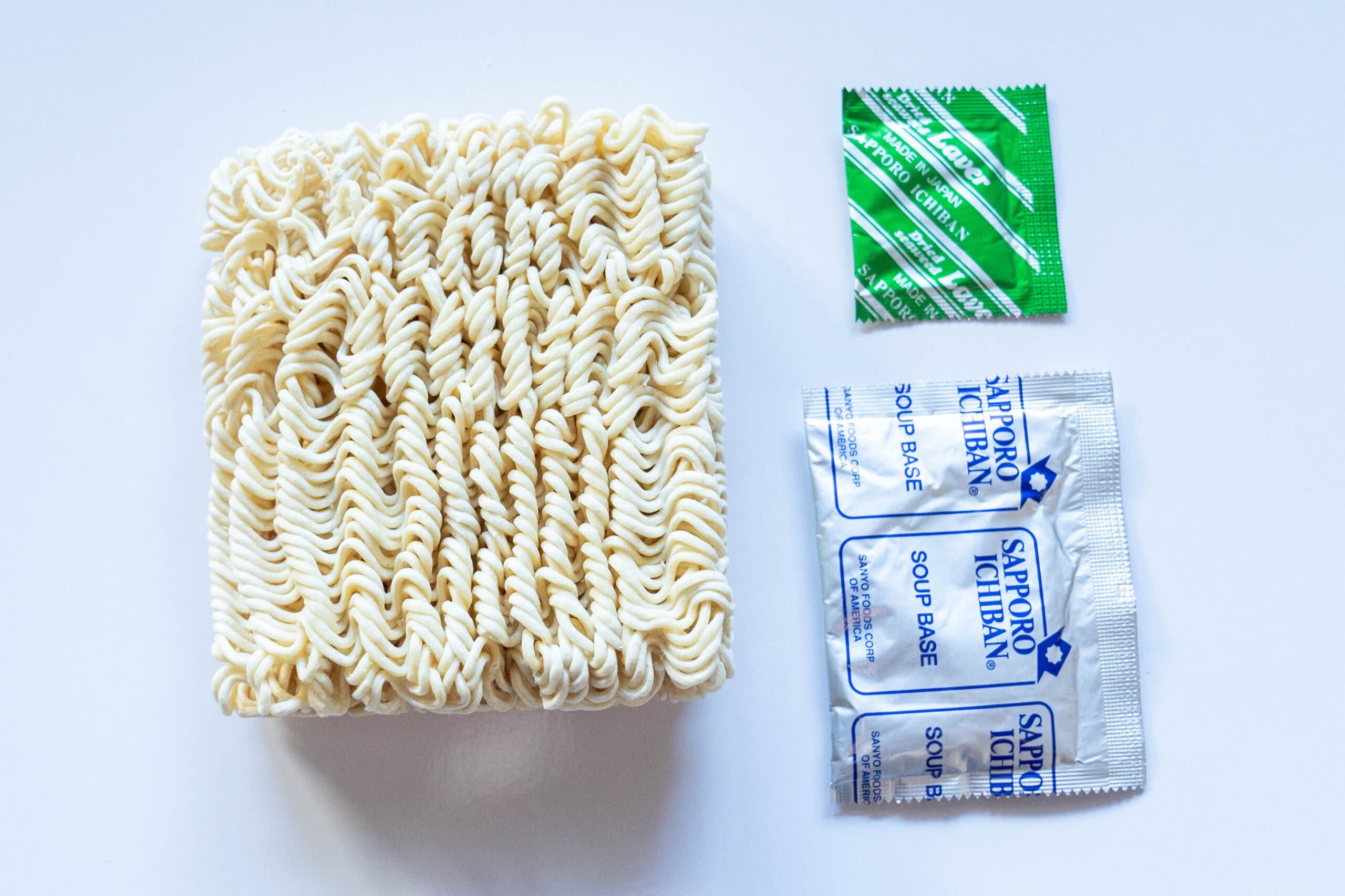 Noodle brick, soup base, and seasoning packet