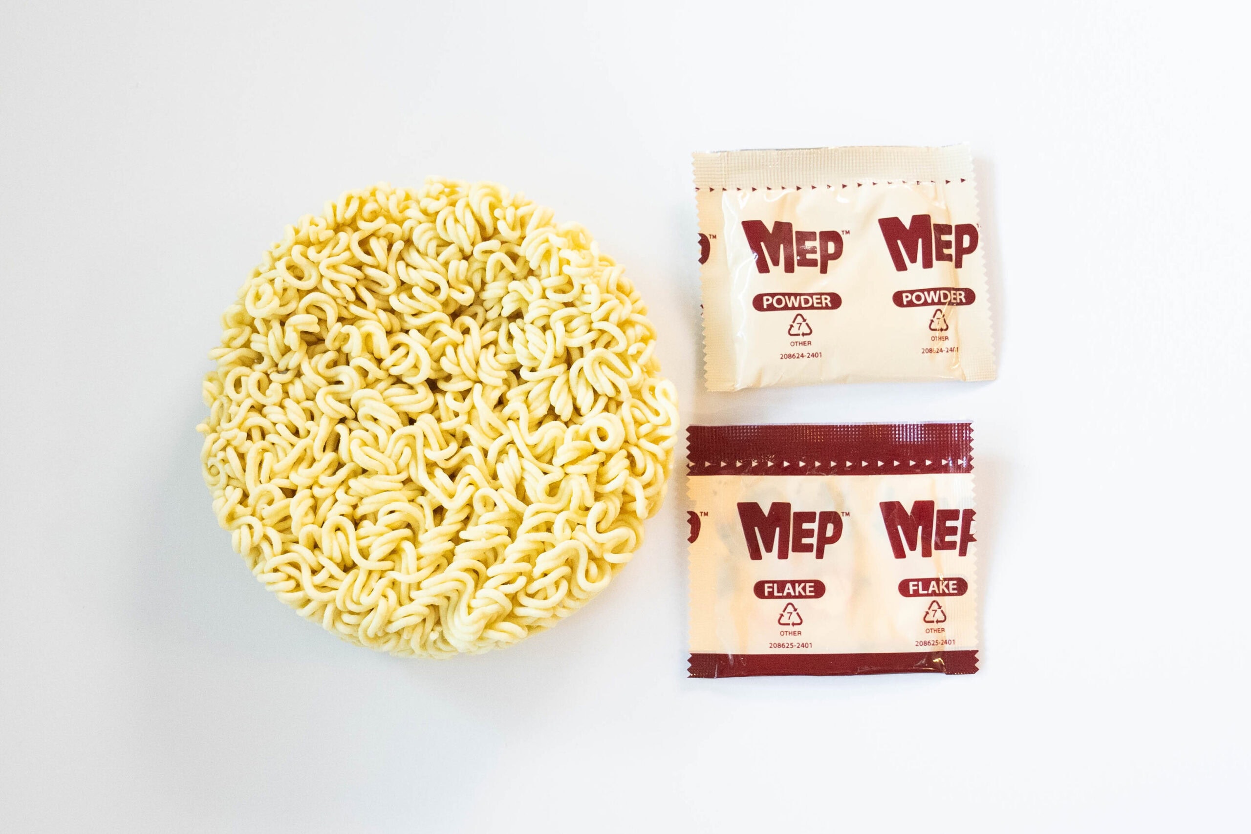Circle noodle brick, flake, and powder packets.