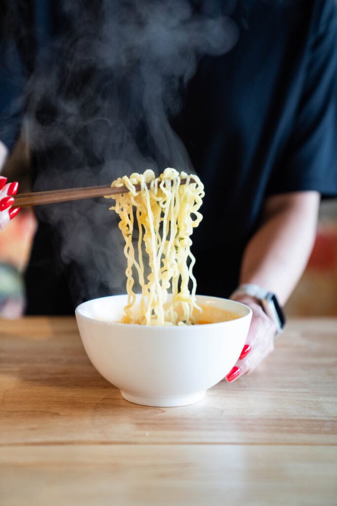 Noodle pull with chopsticks
