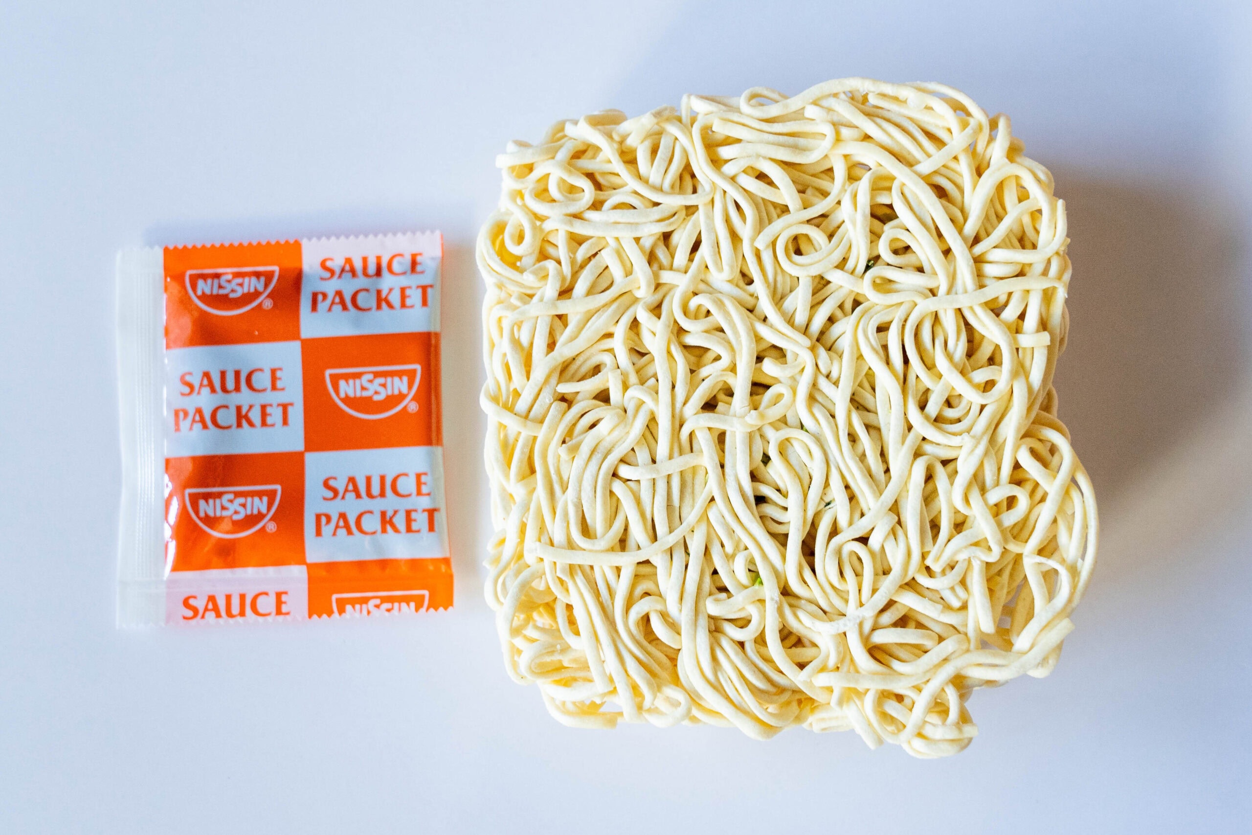 Sauce packet and square noodle brick