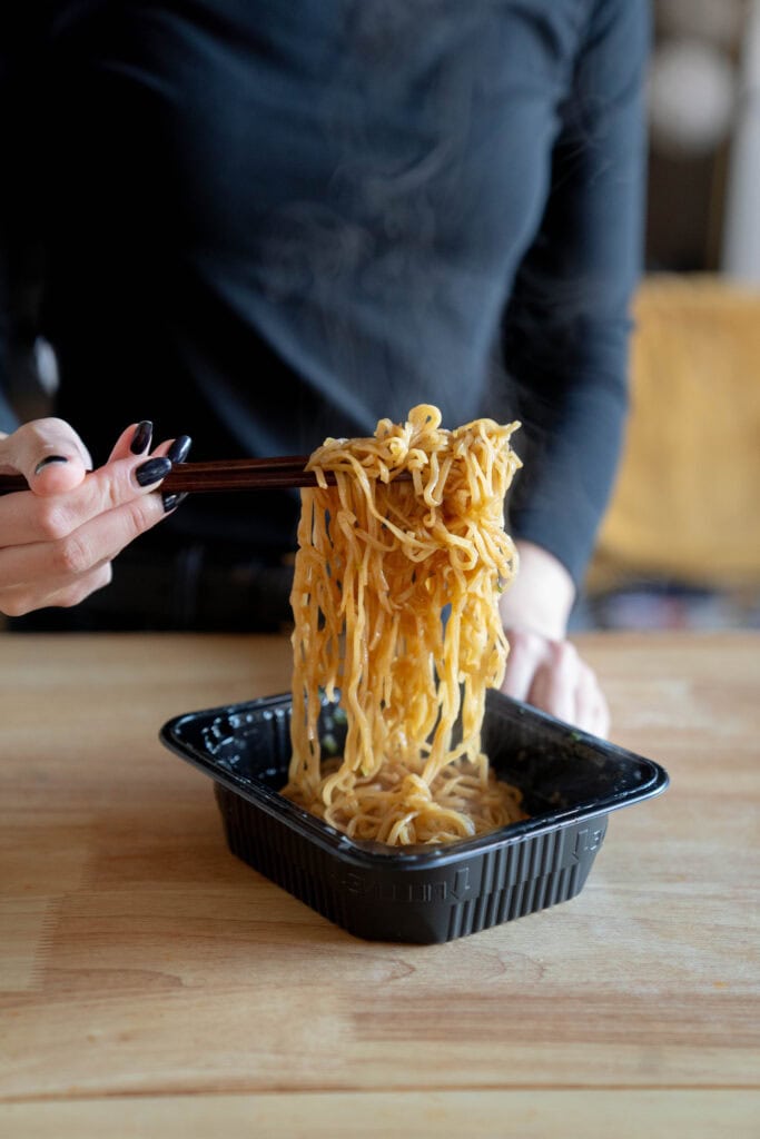 Noodle pull with chopsticks