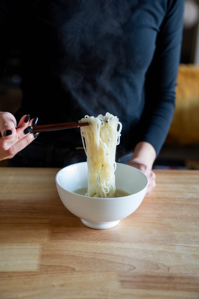 Noodle pull with chopsticks