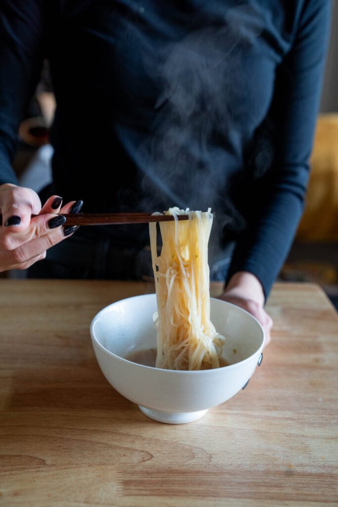 Noodle pull with chopsticks