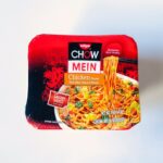 Nissin Chow Mein Chicken Noodles tray package on a white background