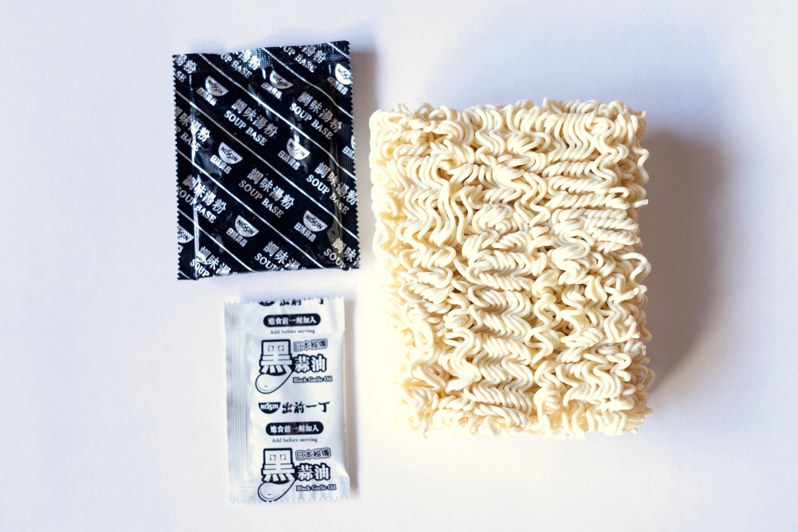 Soup base, seasoning oil, and square noodle brick